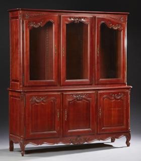 Appraisal: French Louis XV Style Carved Cherry Bookcase th c the