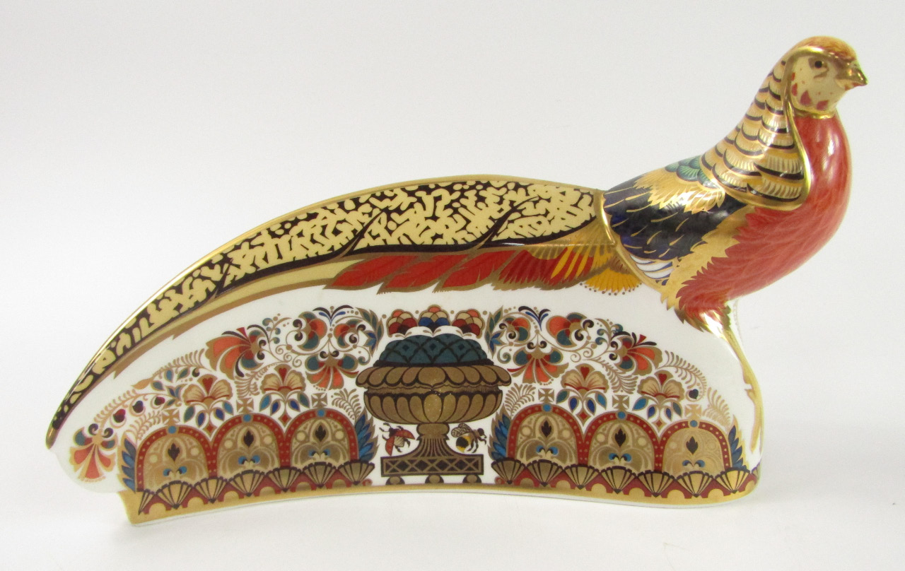 Appraisal: A Royal Crown Derby Imari paperweight modelled as the Golden