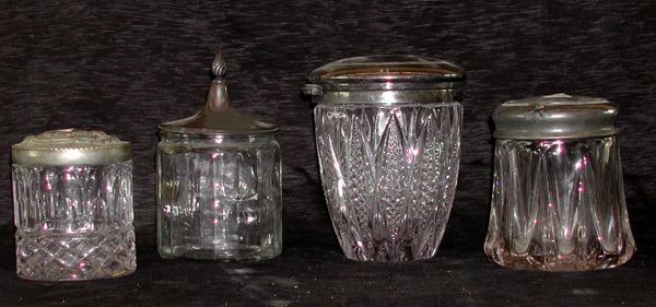 Appraisal: Group of Four Glass Jars with Silver Lids consisting of