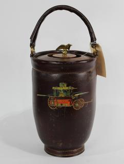 Appraisal: Ice bucket in the form of a vintage fireman's leather