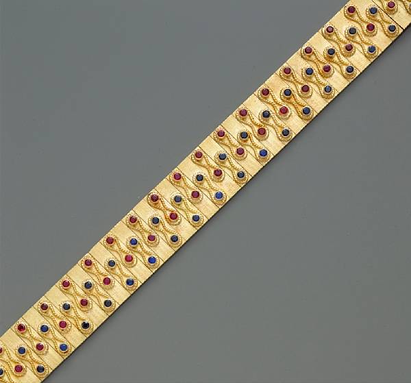 Appraisal: A ruby and sapphire bracelet mounted in eighteen karat gold