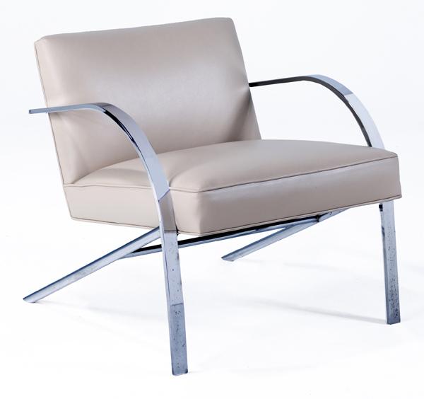 Appraisal: PAUL TUTTLE Lounge chair with eggshell leather cushions on polished