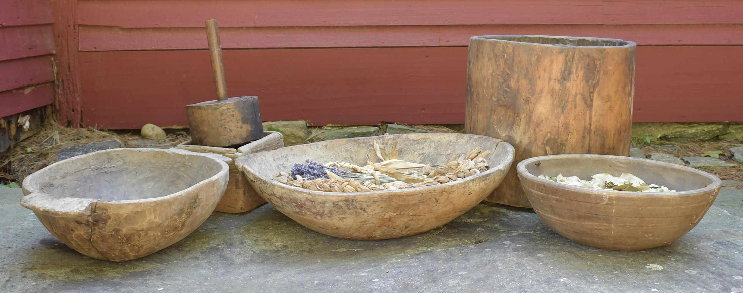 Appraisal: ANTIQUE PRIMITIVE WOODEN WARE Includes trenchers chopping bowl dia large