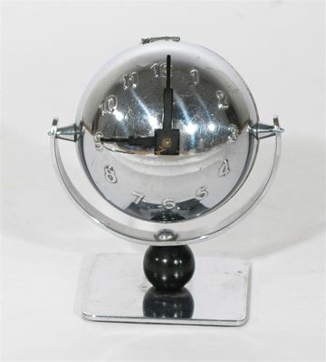 Appraisal: An Art Deco chromed metal desk clock globe form with