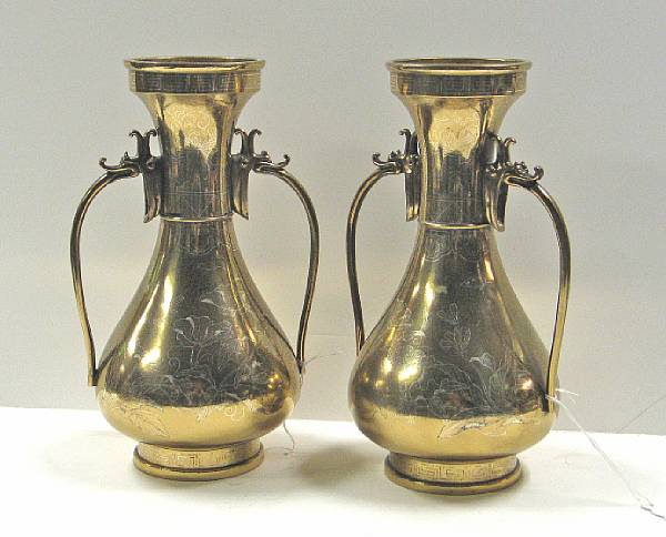 Appraisal: A pair of Chinese style silver-inlaid brass vases Each of