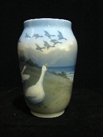 Appraisal: A Royal Copenhagen shoulder form vase with painted geese within