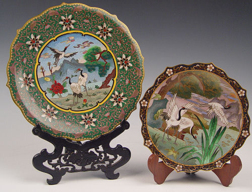 Appraisal: CLOISONNE CHARGERS Shaped edges each centering images of cranes ''