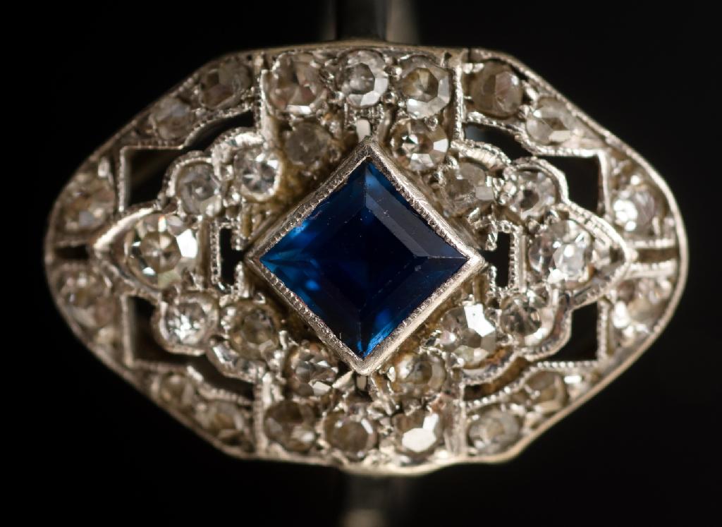 Appraisal: A SAPPHIRE AND DIAMOND RING c the square-cut sapphire collet-set