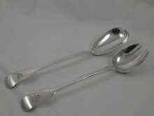 Appraisal: A fine pair of Victorian hallmarked crested silver salad servers