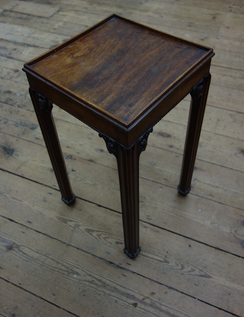 Appraisal: A George III mahogany urn stand the square galleried top