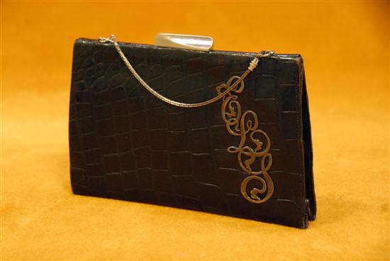 Appraisal: ALLIGATOR PURSE Black alligator with sterling silver monogram