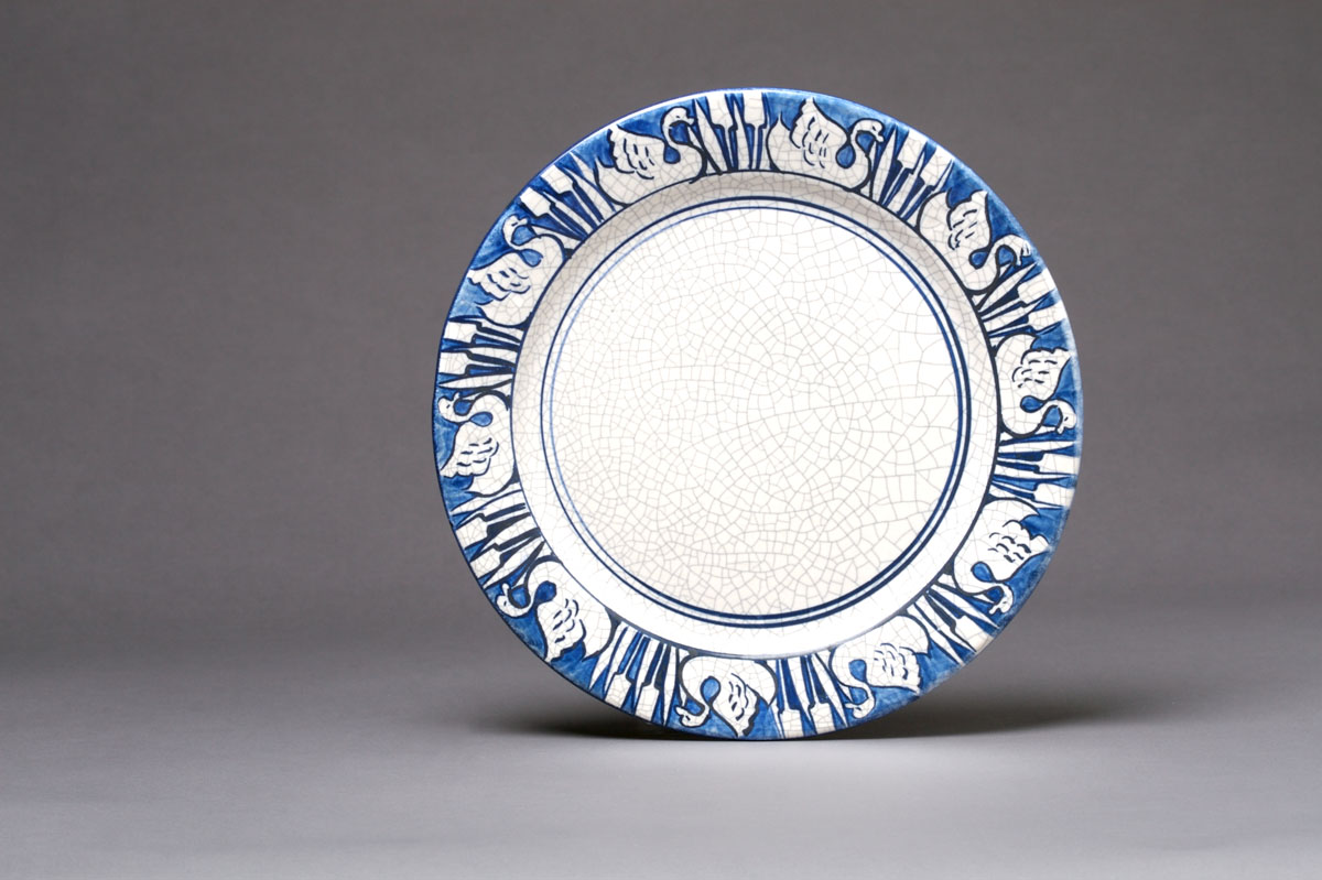 Appraisal: DEDHAM POTTERY 'SWAN' PATTERN PLATE Painted in medium to dark