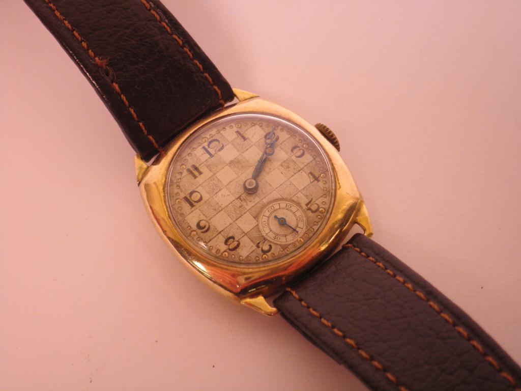 Appraisal: A 's gold gent's wrist watch engraved to the reverse