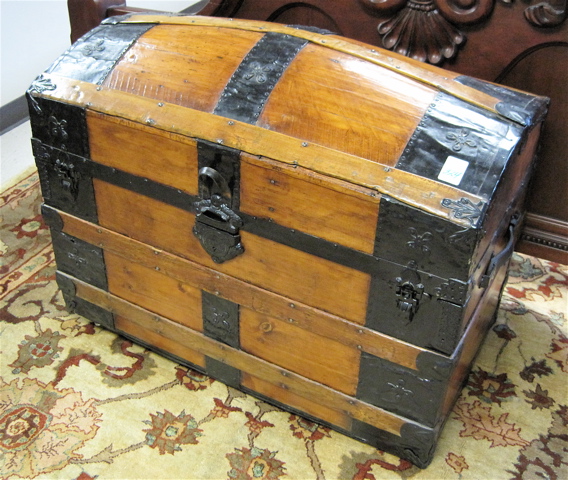 Appraisal: ANTIQUE DOME-TOP TRUNK WITH ESTATE CONTENTS American c the trunk