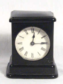 Appraisal: An Ansonia alarm clock cm diameter in a black case