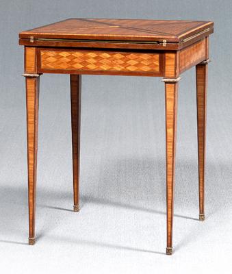 Appraisal: Inlaid French games table revolving top four folding corners in