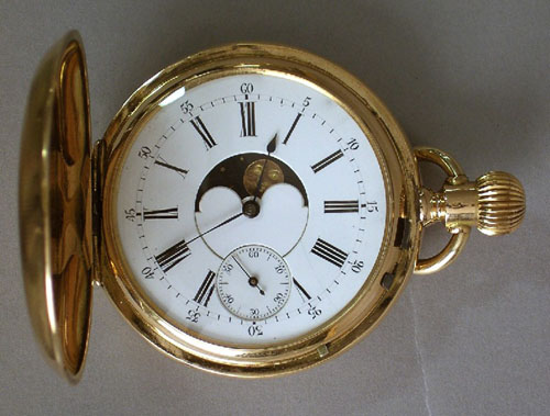 Appraisal: French K gold moon phase calendar double faced pocket watch