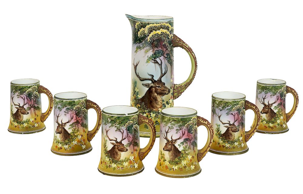 Appraisal: Nippon Japanese Hand Painted Pitcher Tankards Nippon Japanese Moriage 'Christmas