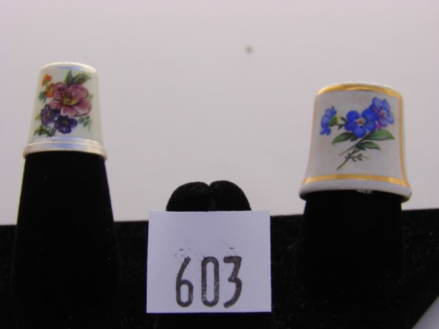 Appraisal: Lot of thimbles One porcelain floral painted One sterling and