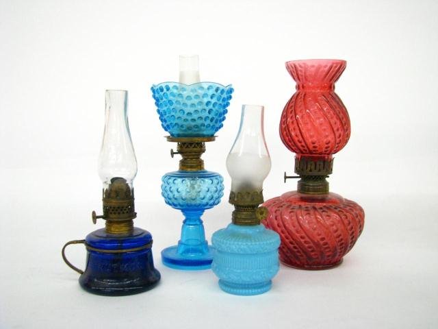 Appraisal: Group of Victorian Colored Glass Miniature Lamps including a cranberry