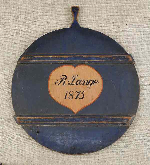 Appraisal: Large painted pine cutting board inscribed R Lange on a