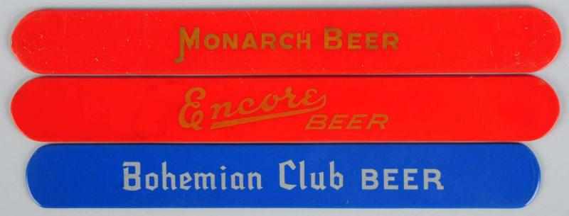 Appraisal: Lot of Double-Sided Beer Foam Scrapers Includes one Monarch one