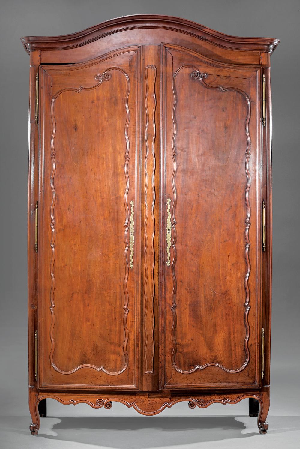 Appraisal: Louis XV Provincial Cherrywood Armoire th c serpentine cornice and