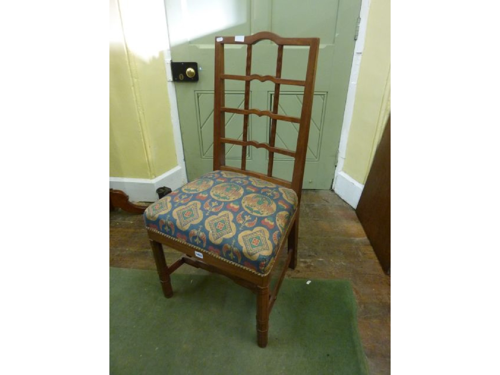 Appraisal: A Cotswold School walnut single chair with ladderback octagonal chamfered