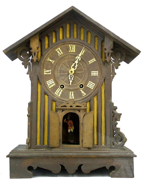 Appraisal: Black Forest trumpeter two train mantel clock the dial within