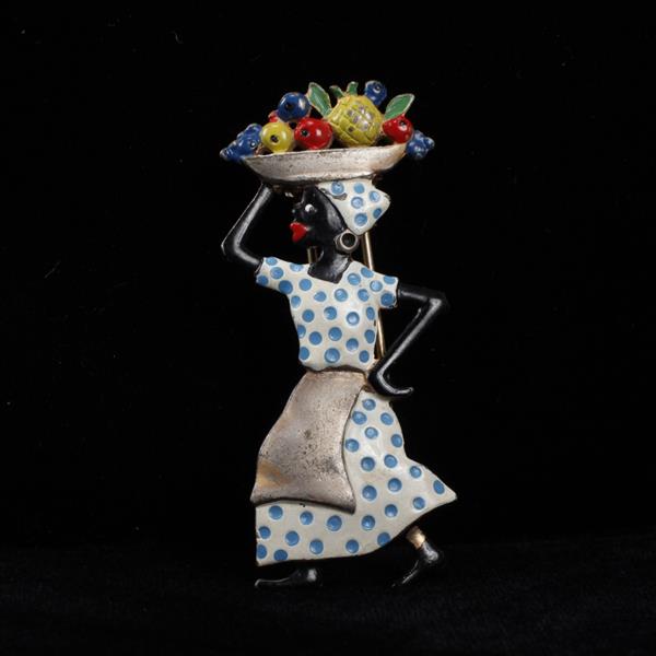 Appraisal: Unmarked Enamel Figural Blackamoor Woman with Fruit Basket Novelty Fur