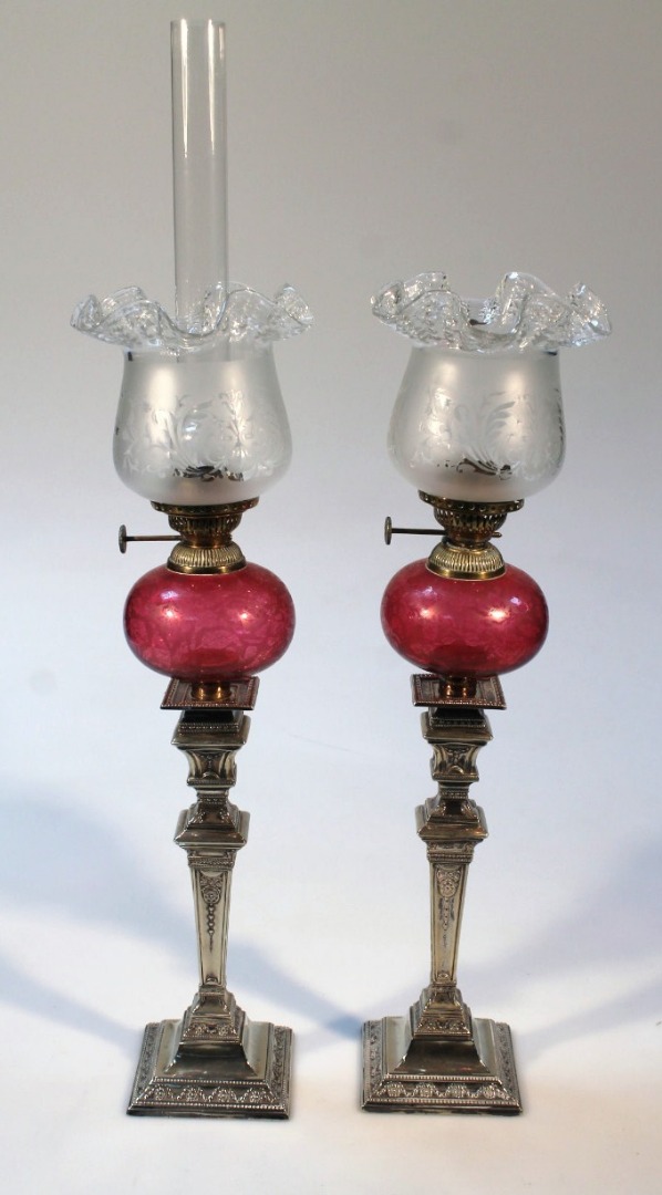 Appraisal: A pair of Mappin Brothers cranberry tinted and silver plated