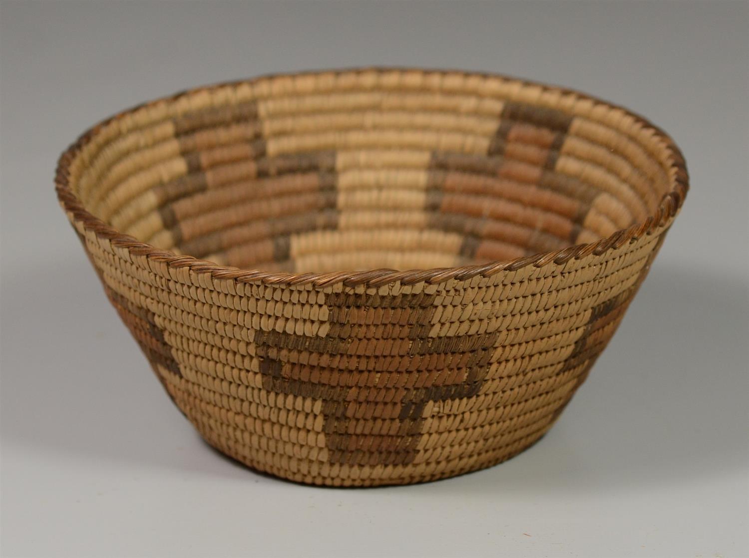 Appraisal: Apache coiled and woven basket cross design in medium brown