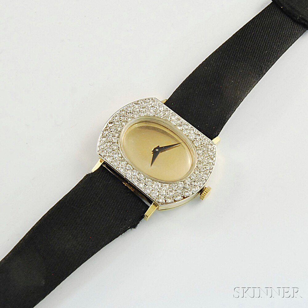 Appraisal: Lady's kt Gold and Diamond Wristwatch with gold-tone face diamond-encrusted