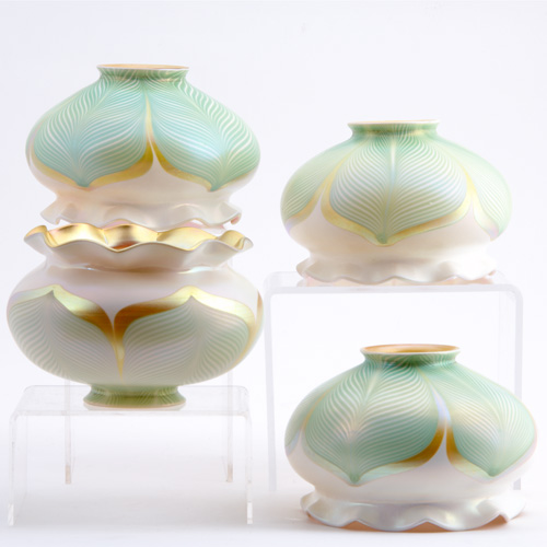 Appraisal: QUEZAL Set of four bell-shaped shades with green and gold