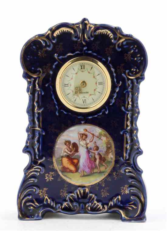 Appraisal: A German Porcelain Cased Mantel Clock having a circular dial