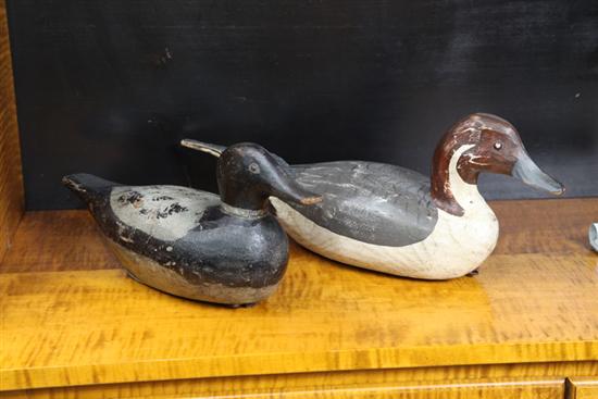 Appraisal: TWO DUCK DECOYS One decoy has gray and black paint