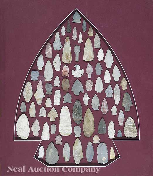 Appraisal: A Framed Grouping of Native American Arrowheads mounted on mat