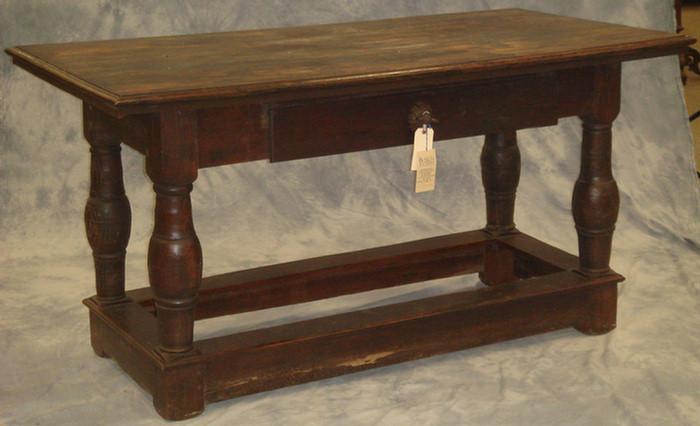 Appraisal: English oak library table with heavy molded top over apron