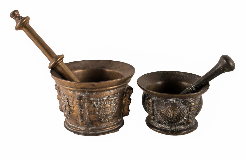 Appraisal: TWO MORTAR PESTLESeach unsigned Condition each oxidized and heavily worn