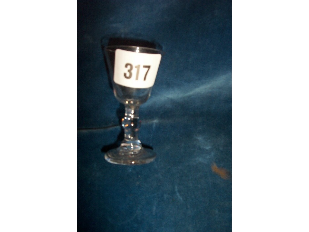 Appraisal: A small Georgian drinking glass with knopped stem and bucket