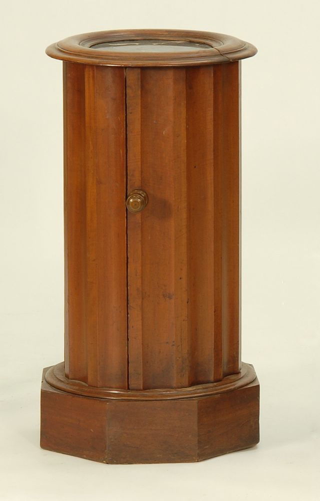 Appraisal: ENGLISH CIRCULAR FLUTED POT CUPBOARD th CenturyWith black marble top