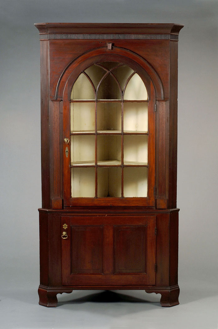 Appraisal: PENNSYLVANIA CHIPPENDALE GUMWOOD ARCHITECTURAL CORNER CUPBOARD In two parts the