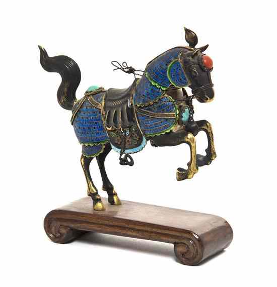 Appraisal: A Silver and Enamel Model of a Horse depicting the