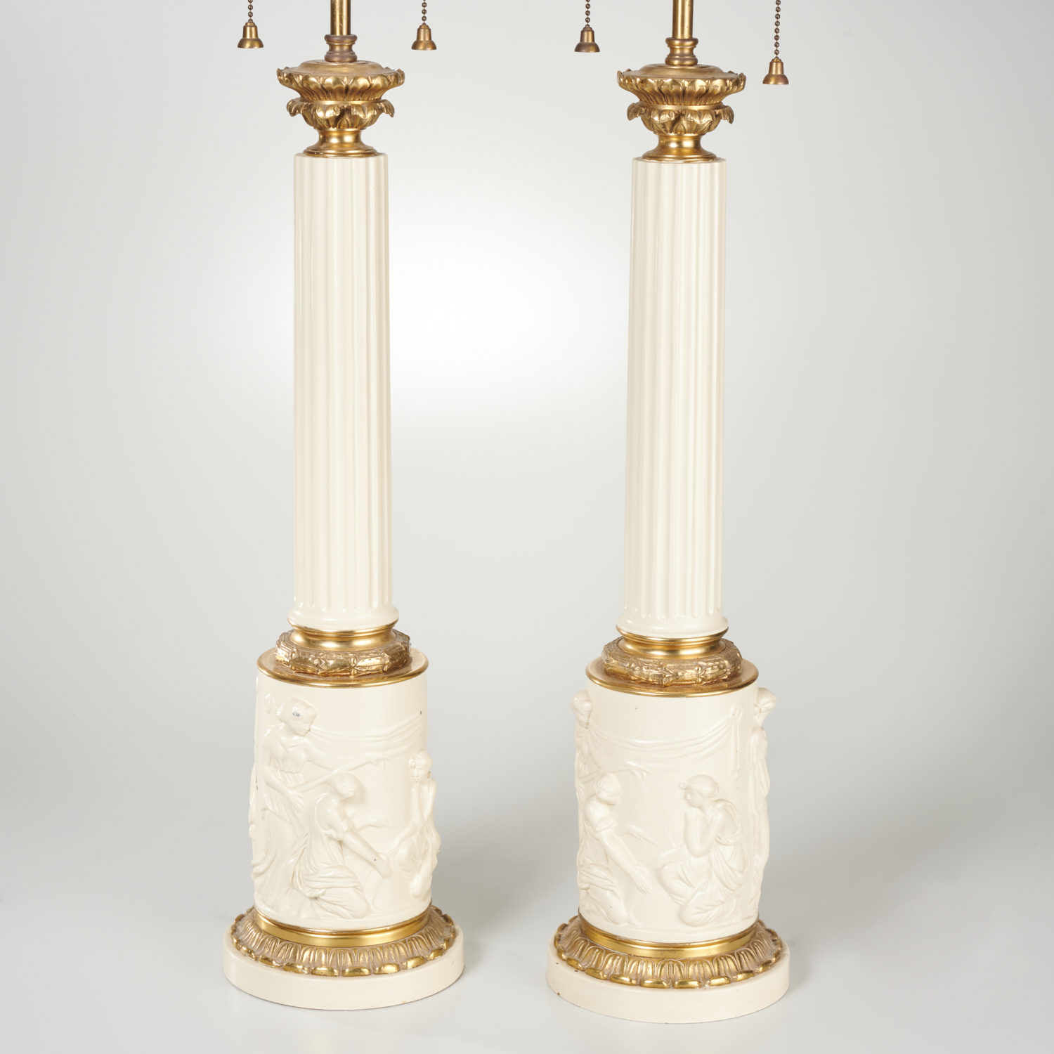 Appraisal: PAIR GRECO-ROMAN STYLE TABLE LAMPS th c with classical figures