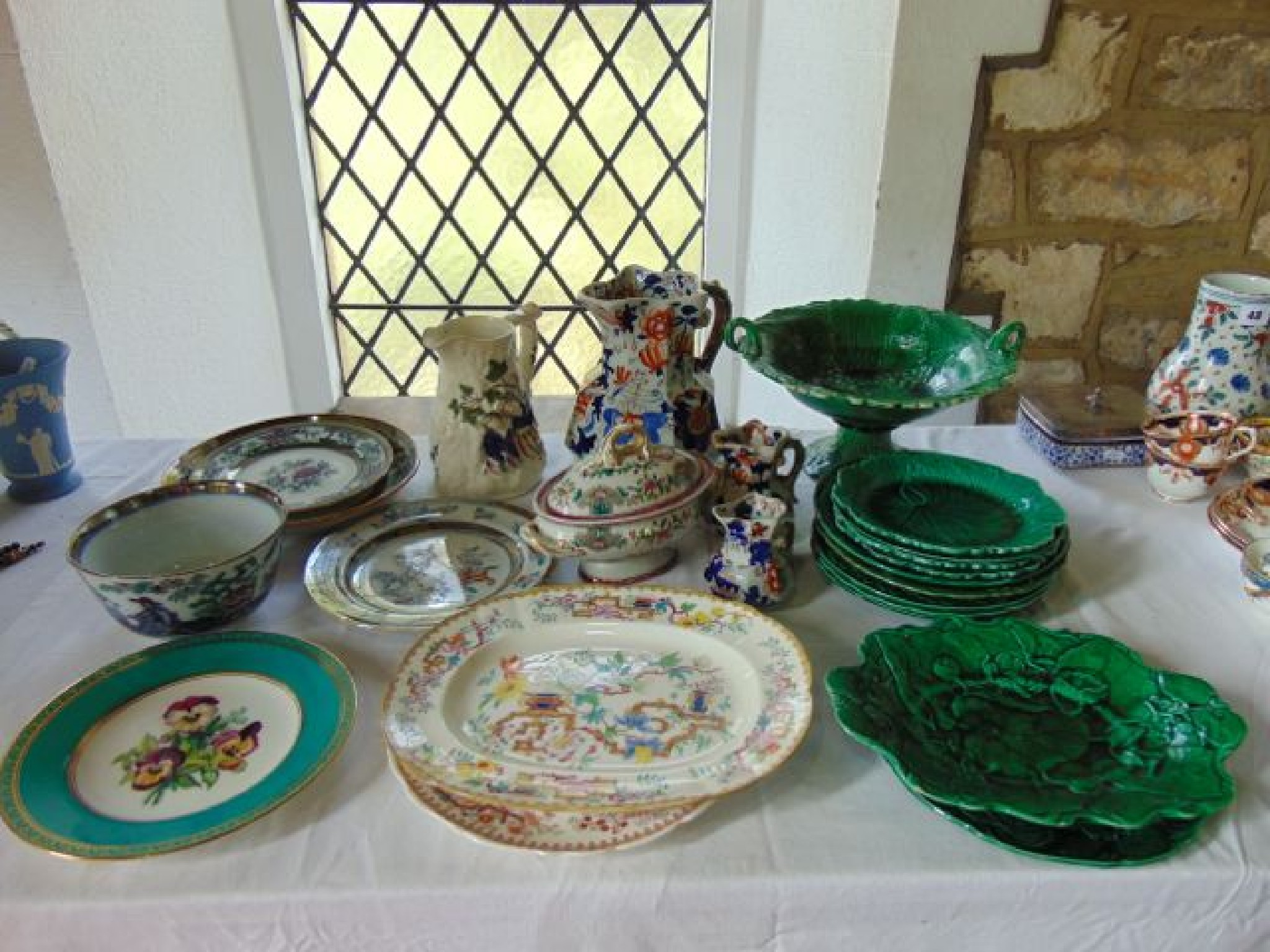 Appraisal: A collection of th century green glazed majolica wares of