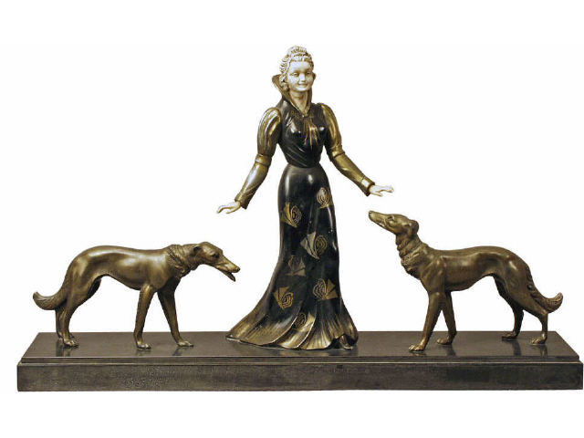 Appraisal: Classic Art Deco statue of gowned lady with Wolfhound dogs