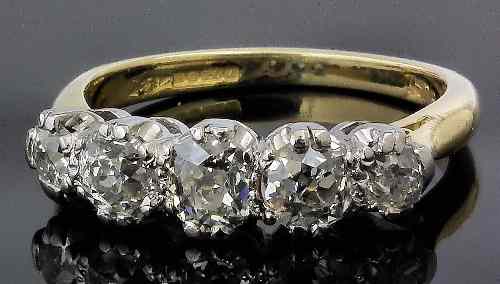 Appraisal: A modern ct gold mounted five stone diamond ring the