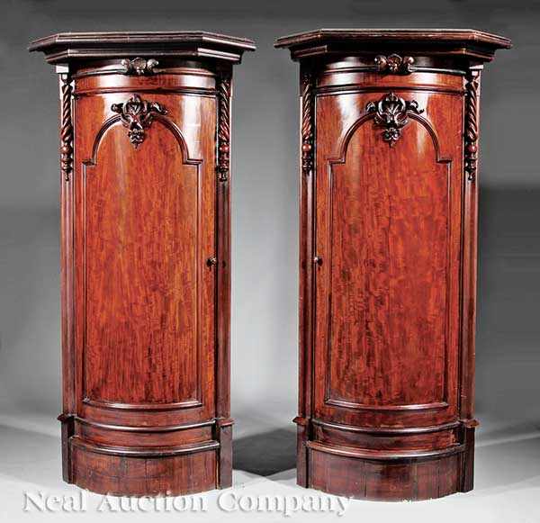 Appraisal: A Pair of William IV Carved Mahogany Bowfront Corner Cabinets