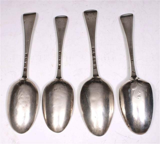 Appraisal: FOUR HANOVERIAN PATTERN SILVER TABLESPOONS one with shell back spoon