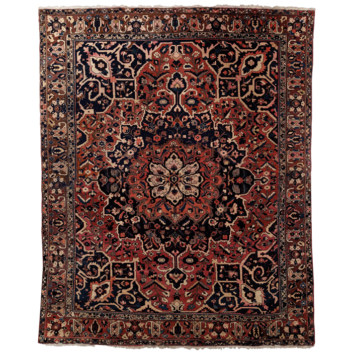 Appraisal: Persian Heriz rug c floral design with central medallion some